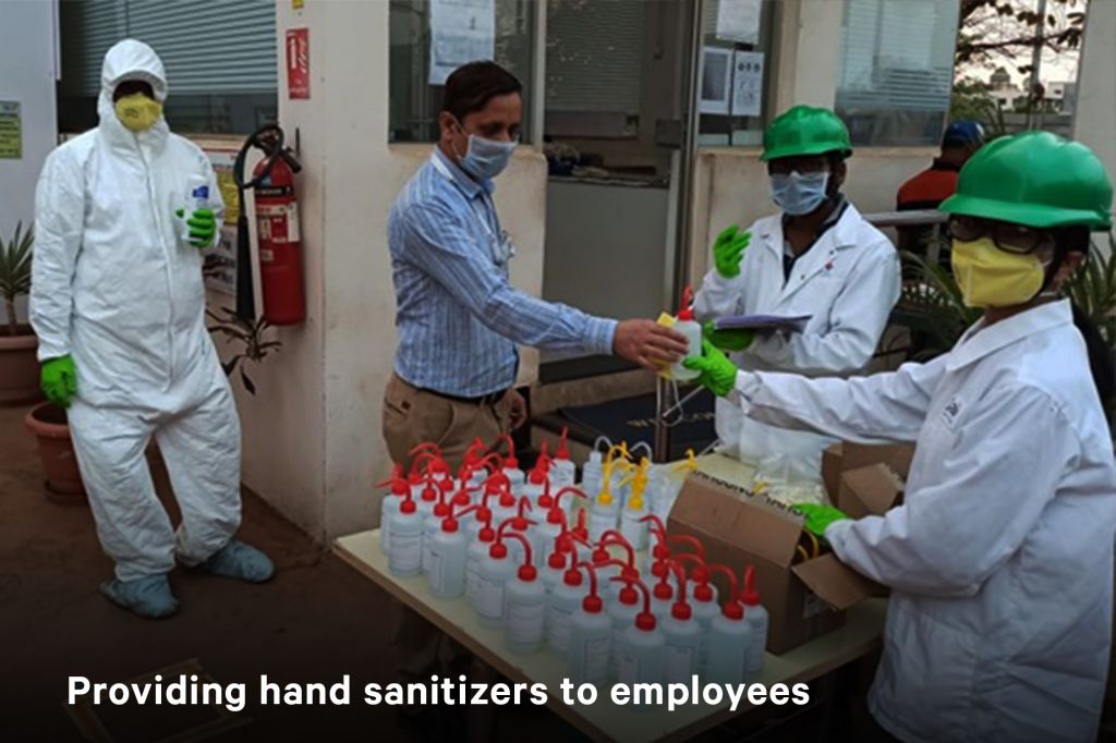 Providing hand sanitizers to employees