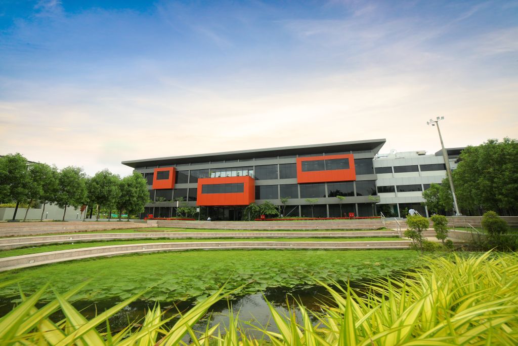 Sai Life Sciences' Integrated Campus in Hyderabad, featuring modern architecture, lush greenery, and sustainable infrastructure for pharmaceutical research and innovation.
